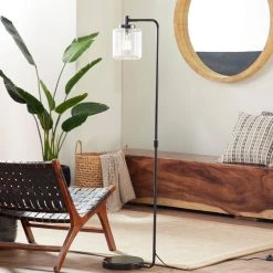 61 in. Black Metal Floor Lamp by Litton Lane 15 61 in. Black Metal Floor Lamp by Litton Lane -Litton Lane Sales black litton lane floor lamps 67723 31 1000
