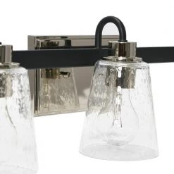 Jameson - 22 in. 3-Light Matte Black and Polished Nickel Vanity Light Metal Seedy Glass by Robert Stevenson Lighting -Litton Lane Sales matte black polished nickel robert stevenson lighting vanity lighting ec1174c 44 1000