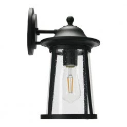 Portside - 1-Light Matte Black Metal Outdoor Wall Cylinder Light with Seedy Glass by Robert Stevenson Lighting -Litton Lane Sales matte black robert stevenson lighting outdoor sconces ec1227 4f 1000